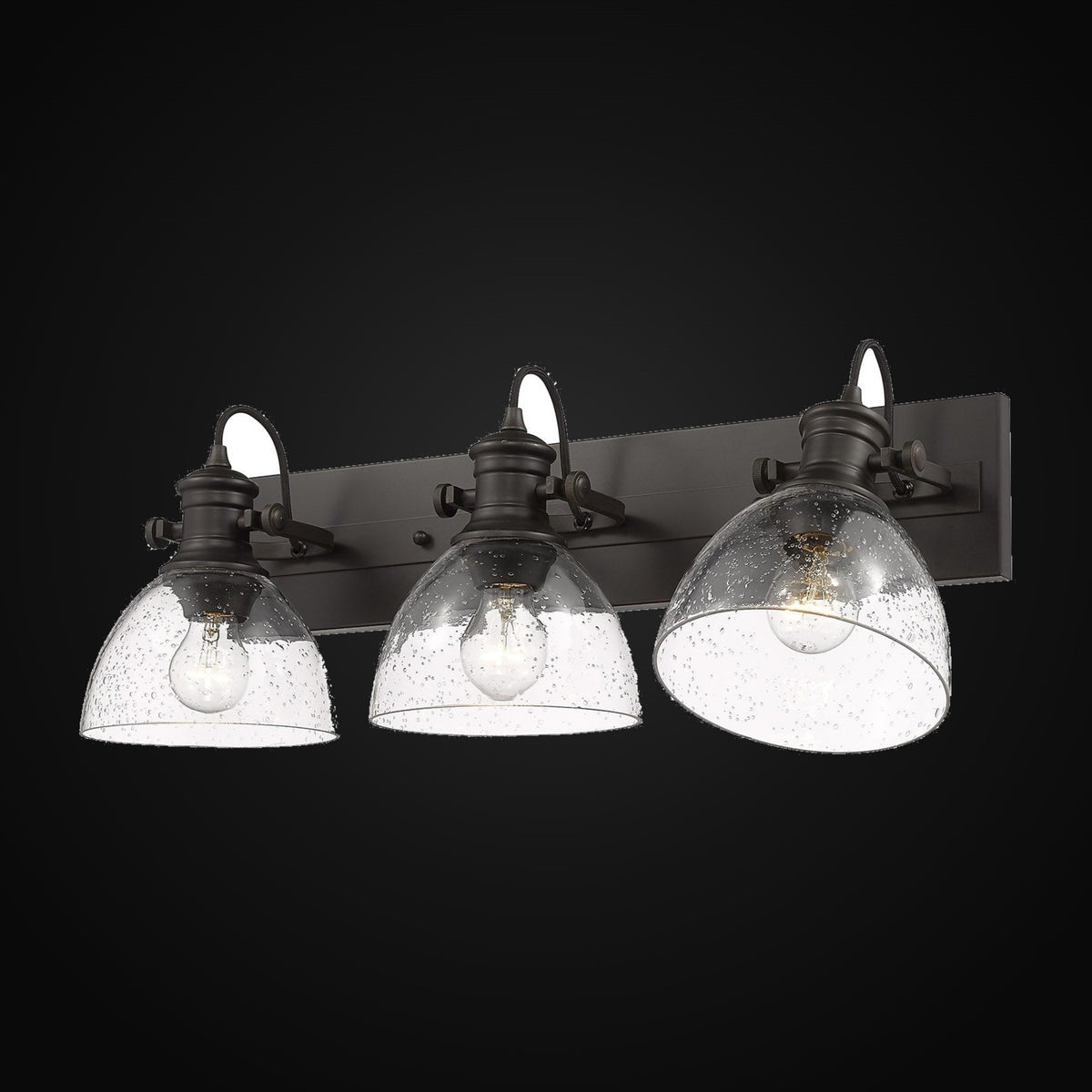 Applique de salle de bain Hines 3 lumières, bronze frotté, verre bullé
